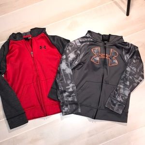 2 boys UA hoodies.